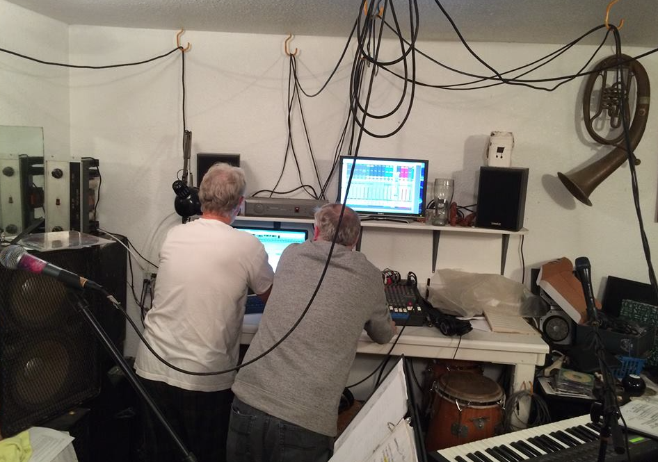 Chris and Tom working on digitally mastering music in the studio